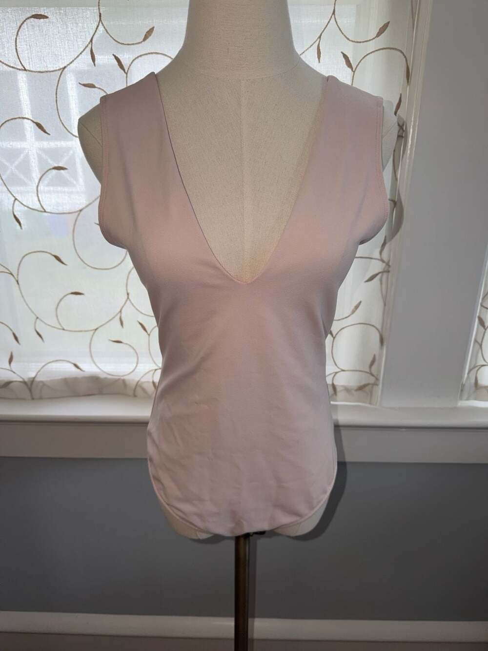Intimately Free People Keep It Sleek Bodysuit in Blush